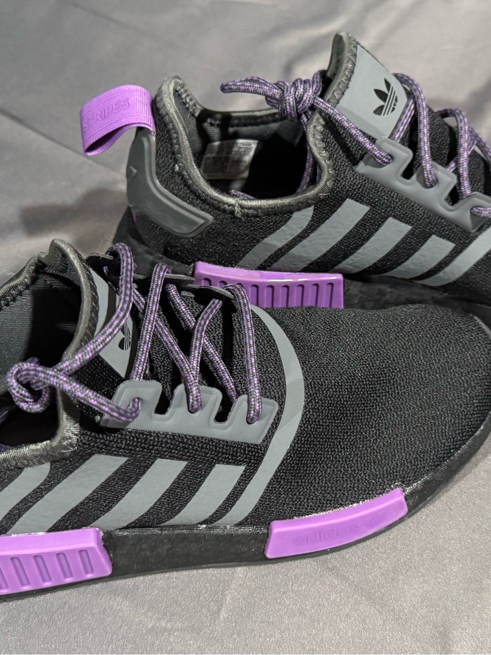 adidas NMD Women’s Black Sneakers with Purple Accents